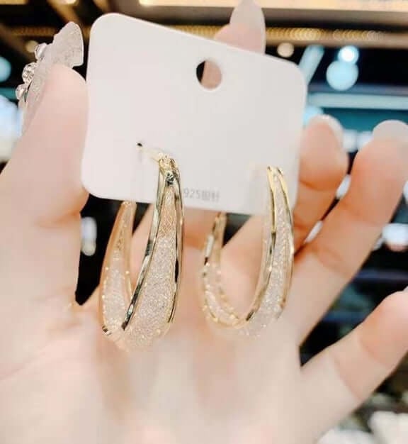 Ressa - Csavart ovális karika fülbevalók